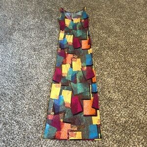 NWOT: Multicolor long symmetrical stretchable dress. Size small.